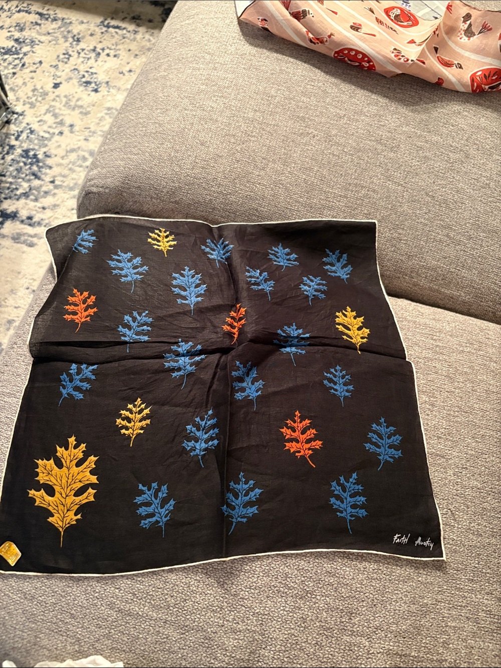 Fashionable Black Leaf-Print Scarf with Blue, Yellow & Orange Accents